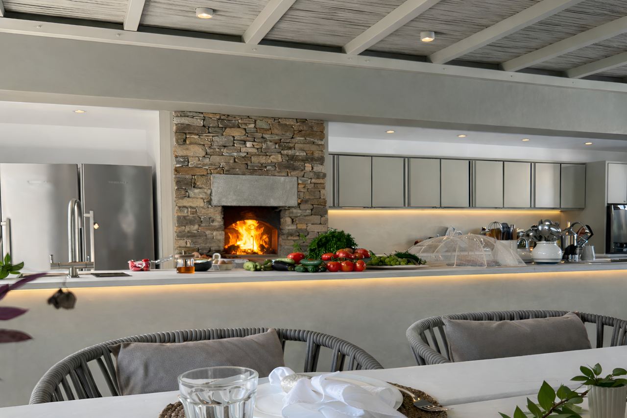 Outdoor kitchen and dining at White Dovecote, Tinos